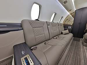 Cessna Citation Sovereign | Interior View of Private Couch & Personal TV Remote